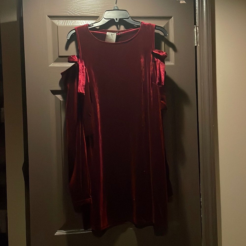 Wine color velour mini dress with shoulders out with bows in the front and back.